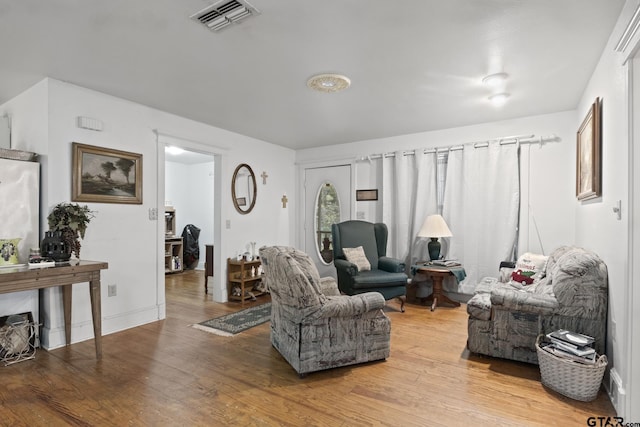 living room with wood-type flooring