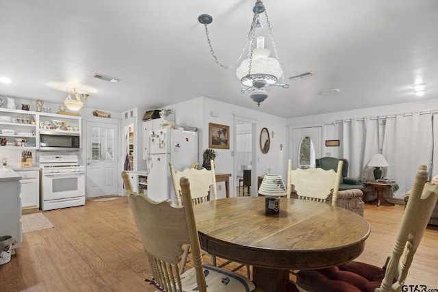 dining area featuring light hardwood / wood-style flooring