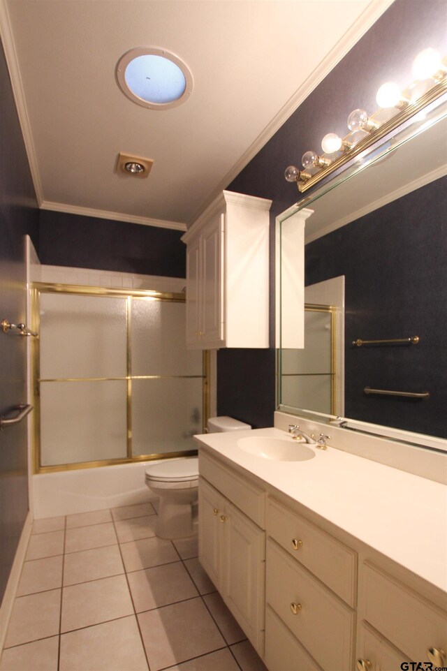 704 Paloma St, Tyler, TX 75703 - full bathroom featuring ornamental molding, tile patterned floors, vanity, and shower / bath combination with glass door