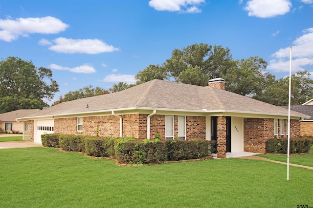 single story home featuring a garage and a front lawn