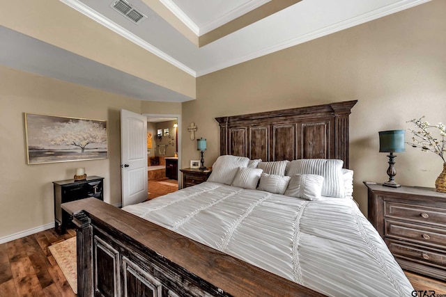 bedroom with dark hardwood / wood-style floors and crown molding