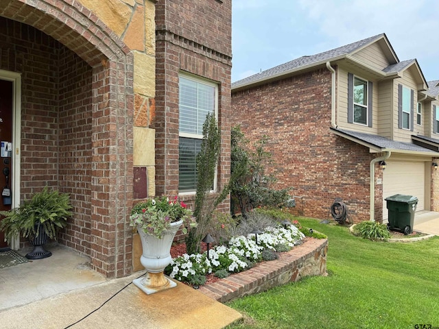 view of property exterior with a lawn and a garage