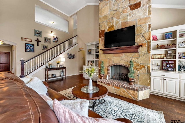 living room featuring a stone fireplace, crown molding, high vaulted ceiling, and dark wood-type flooring