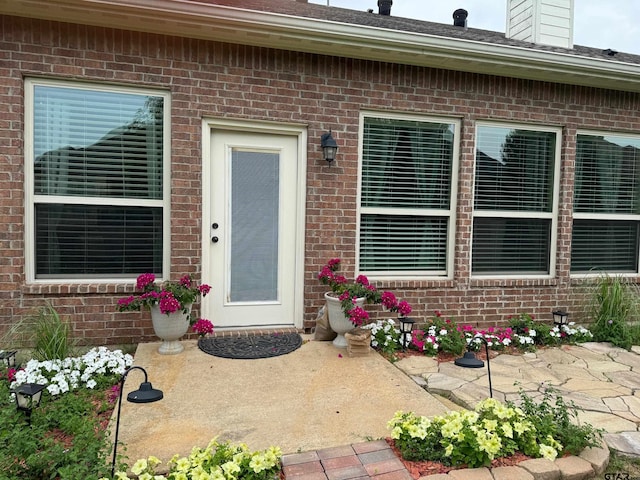 doorway to property featuring a patio area