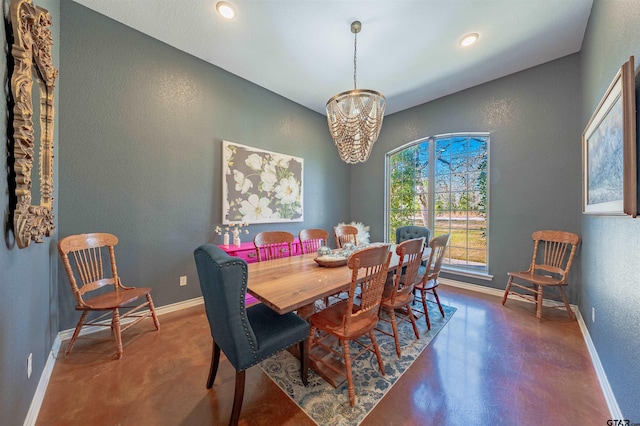 dining room with a notable chandelier