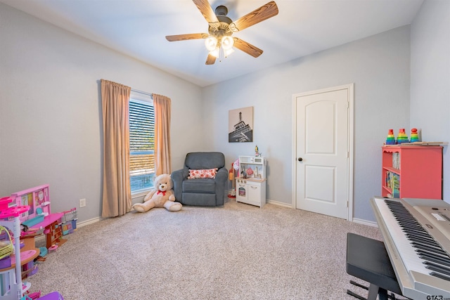 recreation room featuring carpet flooring and ceiling fan