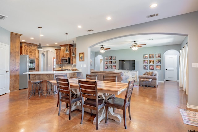 dining room with ceiling fan