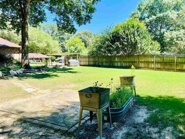 view of yard with fence