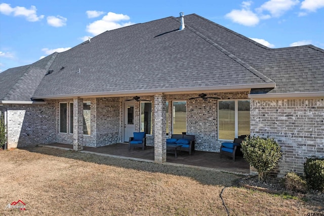 back of property featuring a yard, an outdoor hangout area, a patio, and ceiling fan