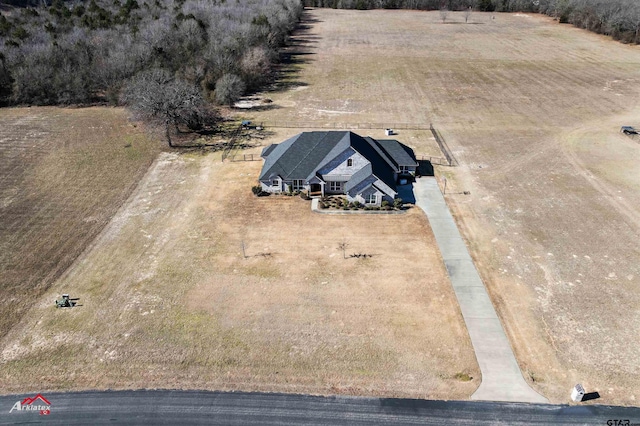 birds eye view of property featuring a rural view