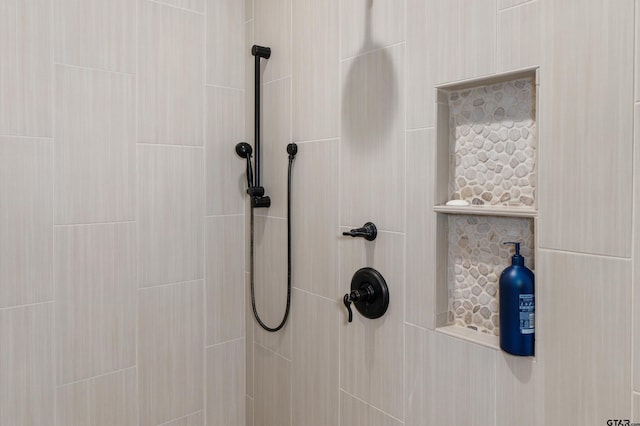 details featuring a tile shower