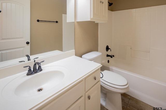 bathroom with tile patterned flooring, vanity, toilet, and shower / bathtub combination