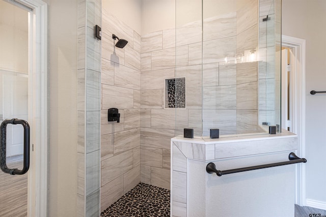 bathroom featuring an enclosed shower