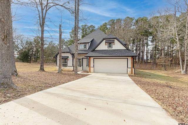 view of front of property with a garage