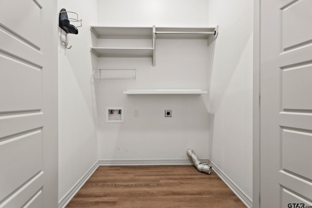 washroom featuring electric dryer hookup, washer hookup, and dark hardwood / wood-style flooring