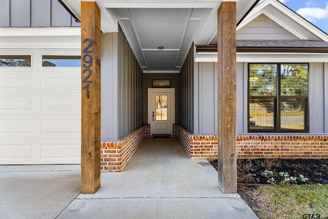 entrance to property featuring a garage