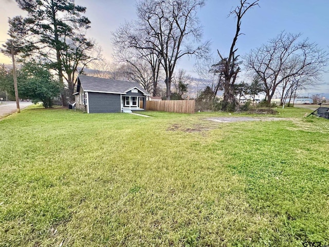 view of yard with fence