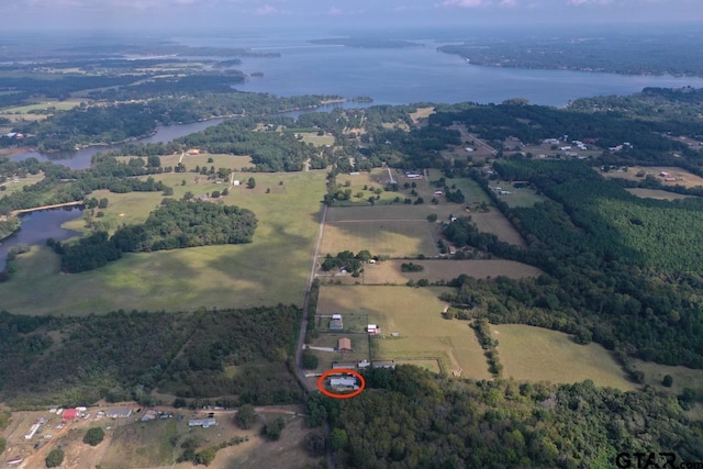 bird's eye view featuring a rural view and a water view