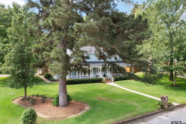 408 E Forest Dr, White Oak, TX 75693 - view of front of house with a porch and a front yard