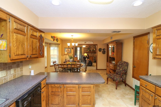 kitchen featuring a textured ceiling, black dishwasher, kitchen peninsula, a notable chandelier, and decorative backsplash