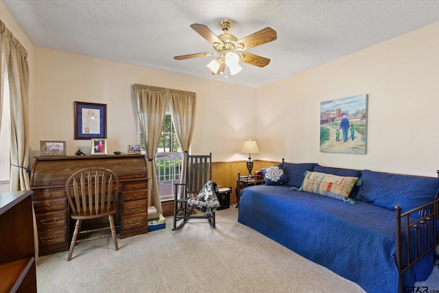 408 E Forest Dr, White Oak, TX 75693 - carpeted bedroom with ceiling fan and a textured ceiling