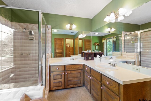 408 E Forest Dr, White Oak, TX 75693 - bathroom with a stall shower and double vanity