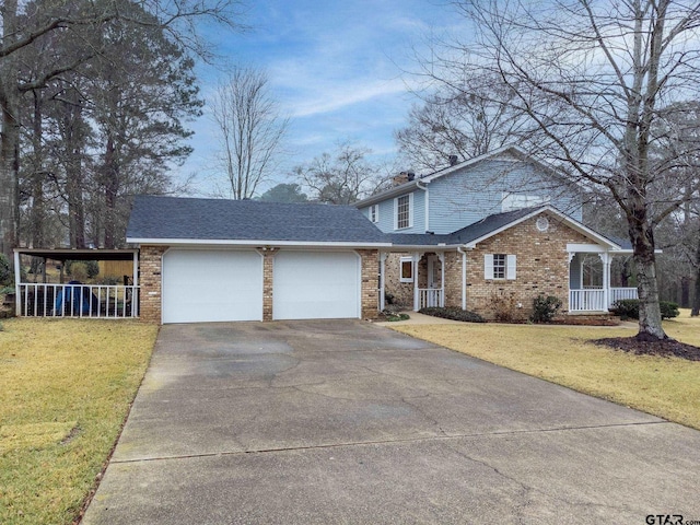 view of front property featuring a garage, covered porch, and a front lawn