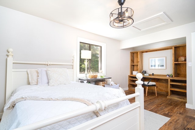 bedroom with dark wood-type flooring