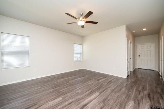 1439 Monterey Dr, Longview, TX 75601 - spare room featuring a ceiling fan, dark wood-style floors, and recessed lighting