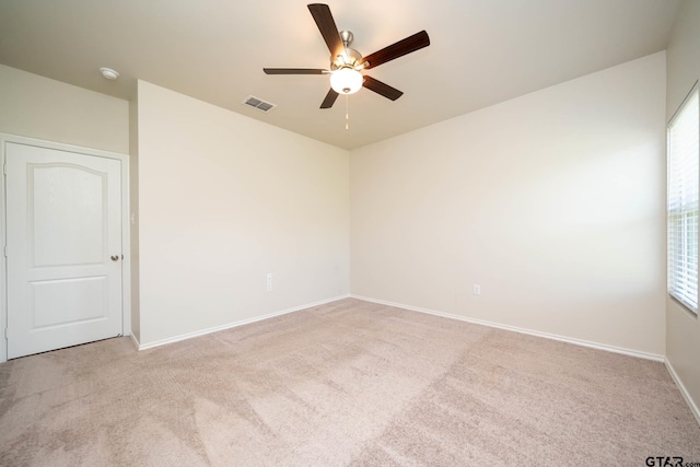 1439 Monterey Dr, Longview, TX 75601 - empty room with a ceiling fan and carpet