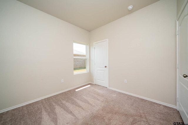 1439 Monterey Dr, Longview, TX 75601 - unfurnished bedroom with carpet floors and baseboards