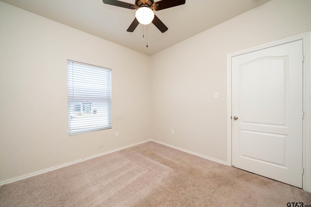 1439 Monterey Dr, Longview, TX 75601 - unfurnished room featuring light colored carpet and ceiling fan