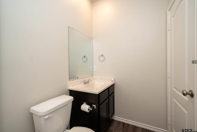 1439 Monterey Dr, Longview, TX 75601 - bathroom featuring wood finished floors and vanity