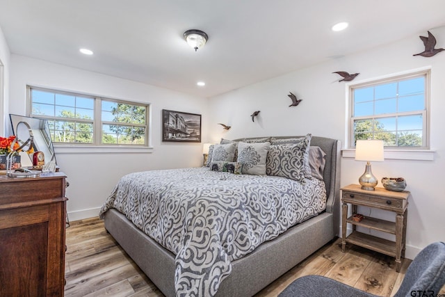 bedroom featuring light hardwood / wood-style floors