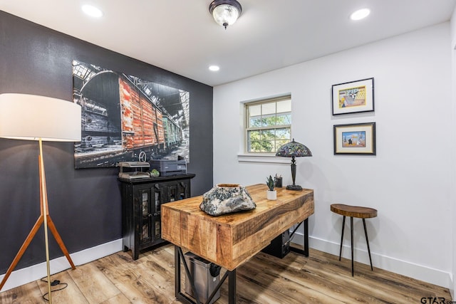 office with wood-type flooring