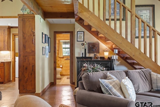 16887 Rainbow Ridge Cir, Tyler, TX 75707 - living area with stairway, beamed ceiling, and light wood-style flooring