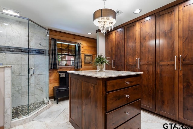 16887 Rainbow Ridge Cir, Tyler, TX 75707 - walk in closet with light marble finish floors and a chandelier