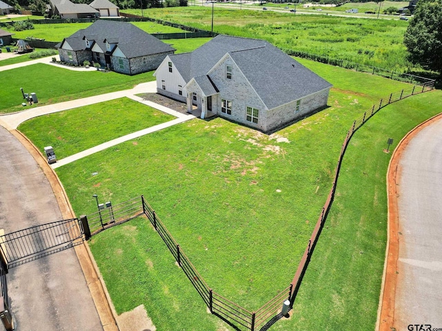 birds eye view of property featuring a rural view