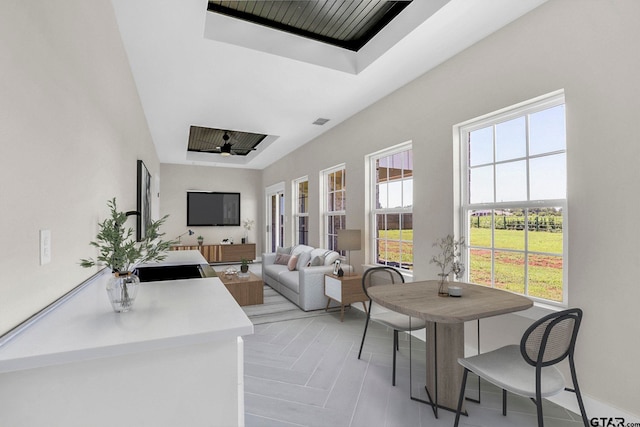 interior space with ceiling fan and a healthy amount of sunlight