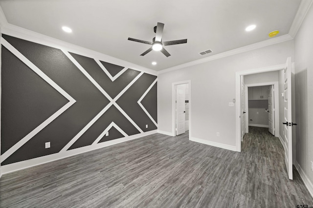 unfurnished bedroom featuring ornamental molding, dark hardwood / wood-style floors, and ceiling fan