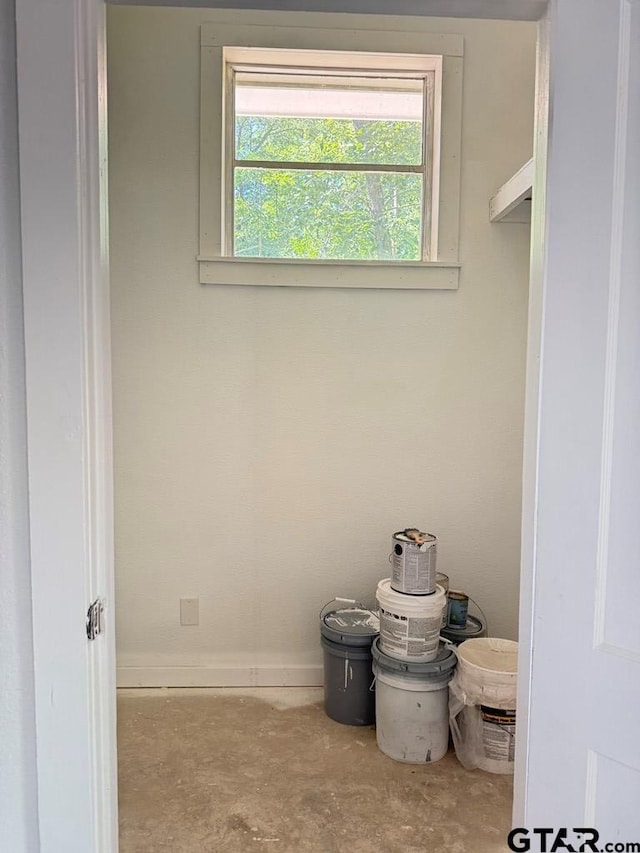 1113 Swanson Dr, Palestine, TX 75801 - clothes washing area featuring healthy amount of natural light and baseboards