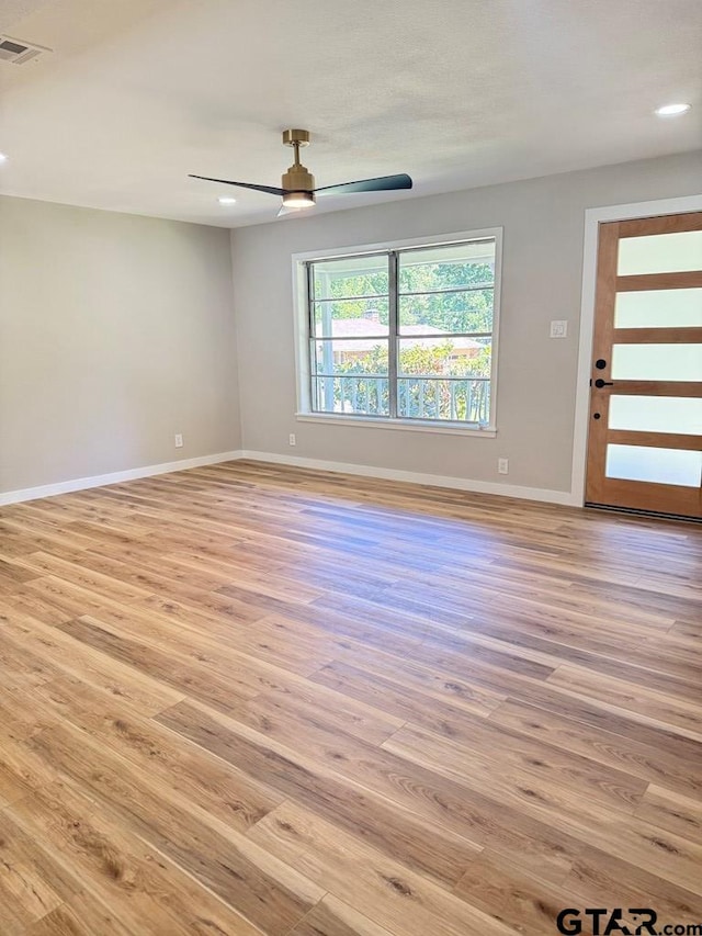 1113 Swanson Dr, Palestine, TX 75801 - unfurnished room with ceiling fan, light wood-style flooring, baseboards, and recessed lighting