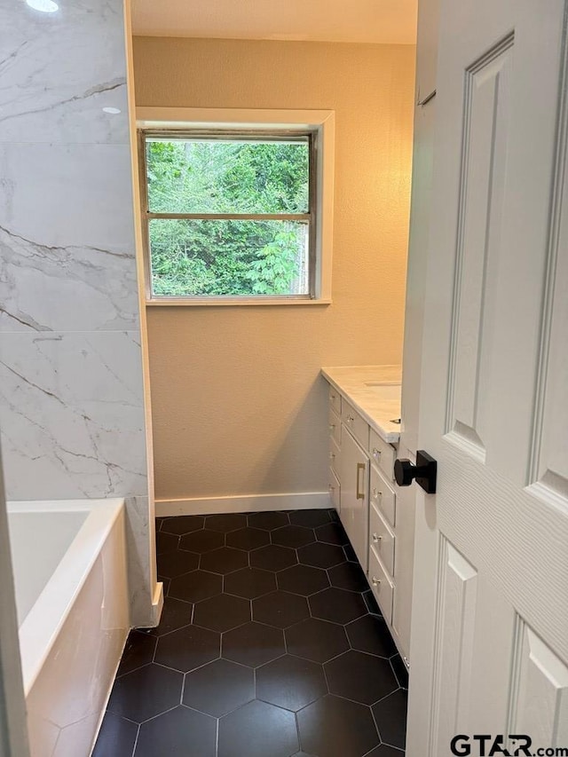 1113 Swanson Dr, Palestine, TX 75801 - bathroom featuring a bath, vanity, tile patterned floors, and a shower