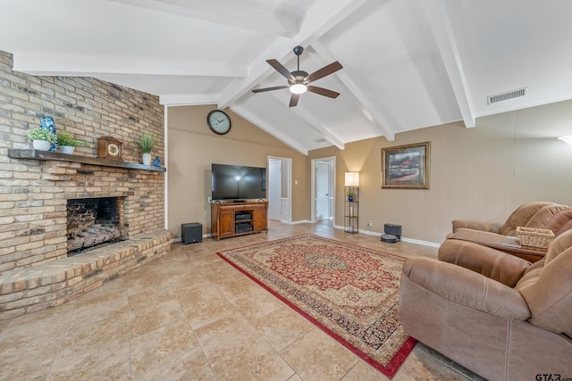 living room featuring ceiling fan, lofted ceiling with beams, and a fireplace