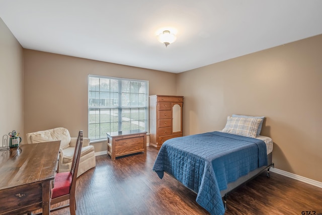 bedroom featuring dark wood-type flooring