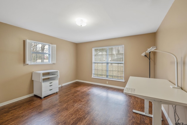 misc room with dark wood-type flooring