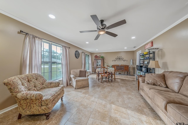 living room with ceiling fan and crown molding