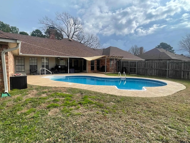 view of pool featuring a pergola, a lawn, and a patio