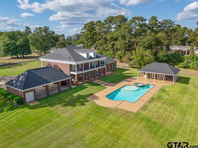 view of swimming pool with a yard, a gazebo, and a patio area