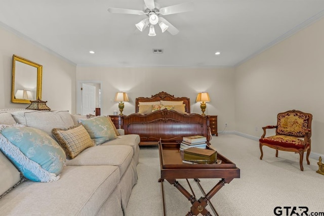 carpeted bedroom featuring crown molding and ceiling fan